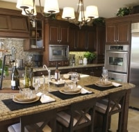 Remodeled Stainless Steel and Stone Serving Island Houston