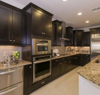 Dark Cabinet and Stainless Steel Kitchen Remodel Houston