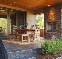 Outdoor Terrace with Wood Ceiling and Stone Fireplace Houston