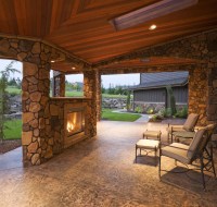 Outdoor Loggia with Wood Ceiling and Stained Concrete Houston